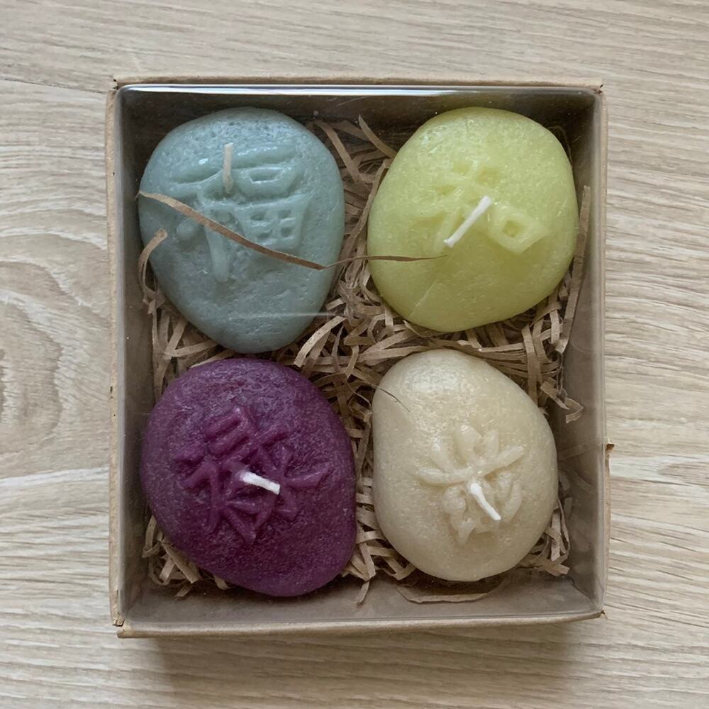 Embossed asian character floating candles